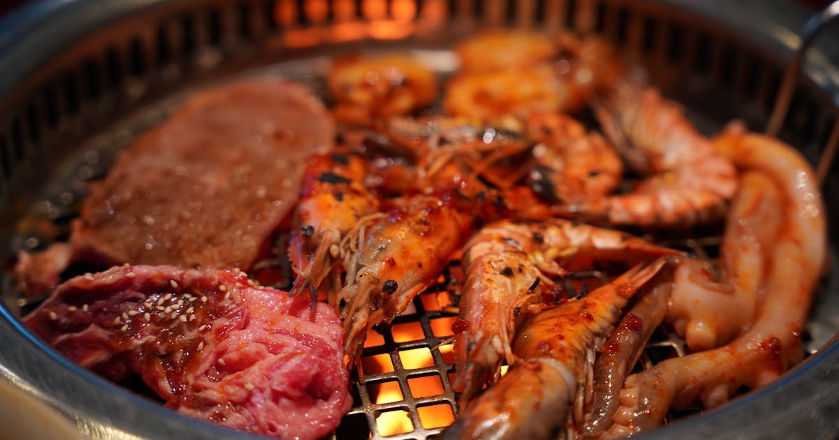 Fresh seafood sizzling on the BBQ grill